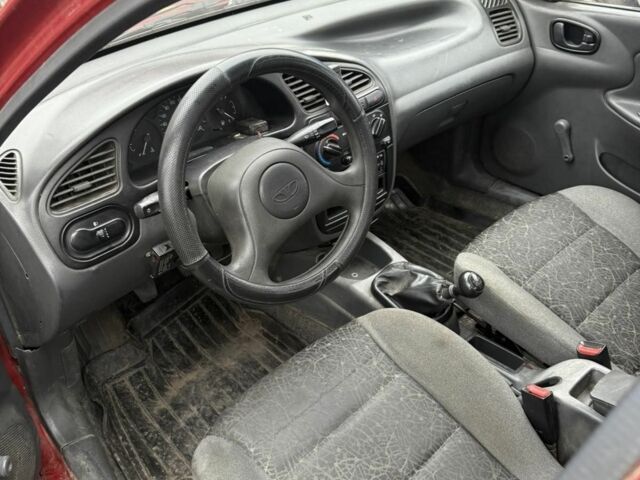 Красный ЗАЗ Ланос, объемом двигателя 1.4 л и пробегом 270 тыс. км за 1150 $, фото 7 на Automoto.ua