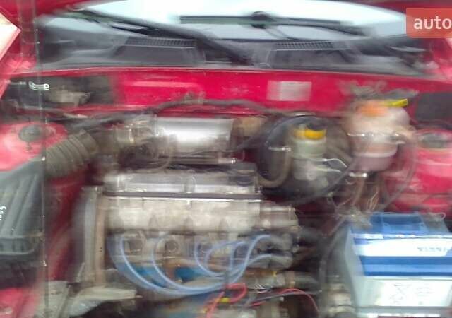 Красный ЗАЗ Ланос, объемом двигателя 1.3 л и пробегом 200 тыс. км за 1900 $, фото 1 на Automoto.ua