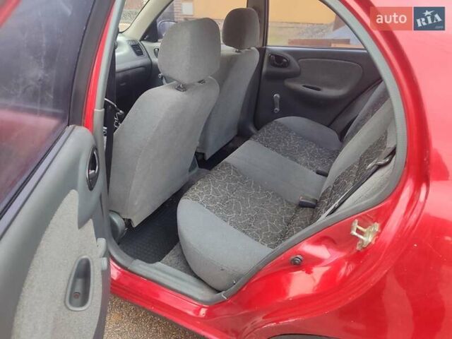 Красный ЗАЗ Ланос, объемом двигателя 1.39 л и пробегом 254 тыс. км за 1500 $, фото 8 на Automoto.ua