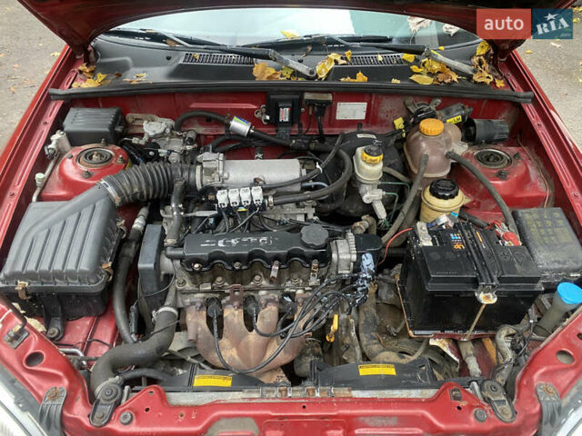 Красный ЗАЗ Ланос, объемом двигателя 1.5 л и пробегом 200 тыс. км за 1950 $, фото 18 на Automoto.ua