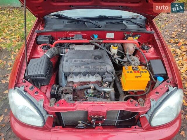 Красный ЗАЗ Ланос, объемом двигателя 1.39 л и пробегом 254 тыс. км за 1500 $, фото 10 на Automoto.ua