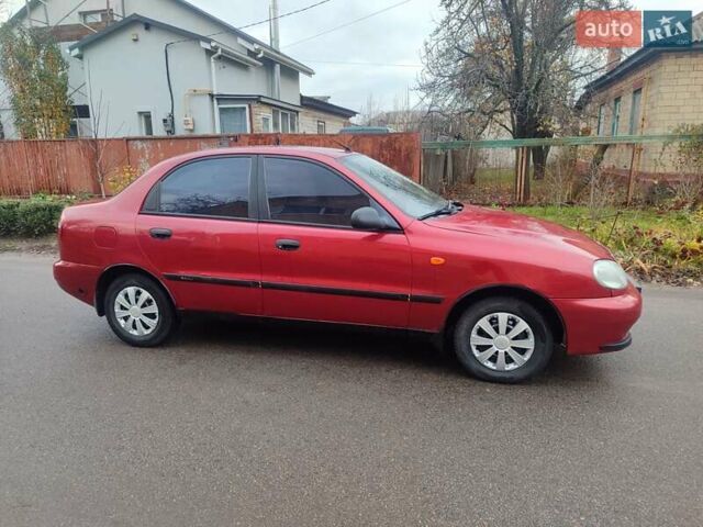 Красный ЗАЗ Ланос, объемом двигателя 1.39 л и пробегом 254 тыс. км за 1500 $, фото 4 на Automoto.ua