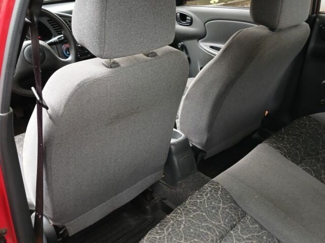 Красный ЗАЗ Ланос, объемом двигателя 1.4 л и пробегом 65 тыс. км за 3700 $, фото 5 на Automoto.ua