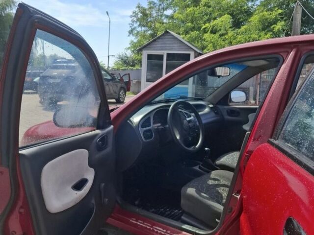 Червоний ЗАЗ Ланос, об'ємом двигуна 1.4 л та пробігом 150 тис. км за 1500 $, фото 6 на Automoto.ua