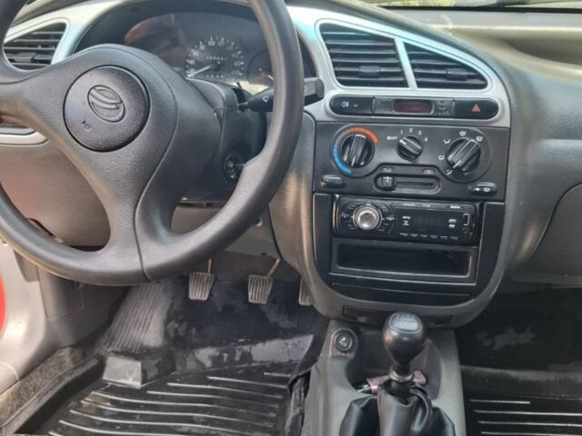 Червоний ЗАЗ Ланос, об'ємом двигуна 1.4 л та пробігом 150 тис. км за 1500 $, фото 2 на Automoto.ua