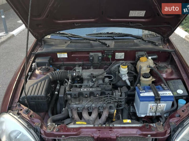 Красный ЗАЗ Ланос, объемом двигателя 1.5 л и пробегом 150 тыс. км за 2100 $, фото 6 на Automoto.ua