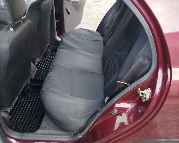 Красный ЗАЗ Ланос, объемом двигателя 1.6 л и пробегом 147 тыс. км за 2500 $, фото 6 на Automoto.ua