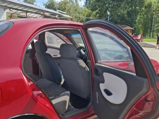 Червоний ЗАЗ Ланос, об'ємом двигуна 1.4 л та пробігом 150 тис. км за 1500 $, фото 5 на Automoto.ua