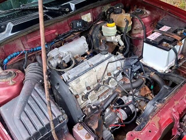 Червоний ЗАЗ Ланос, об'ємом двигуна 1.4 л та пробігом 100 тис. км за 1400 $, фото 7 на Automoto.ua