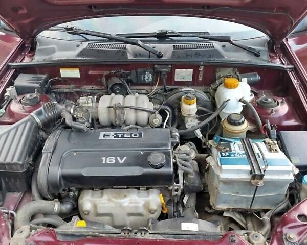 Красный ЗАЗ Ланос, объемом двигателя 1.6 л и пробегом 147 тыс. км за 2500 $, фото 10 на Automoto.ua