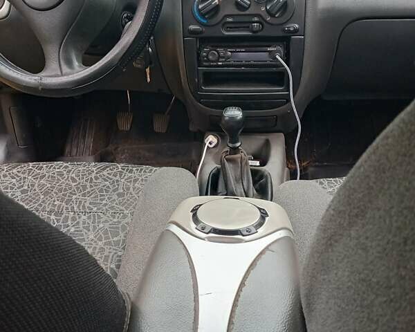 Красный ЗАЗ Ланос, объемом двигателя 1.39 л и пробегом 190 тыс. км за 1850 $, фото 7 на Automoto.ua