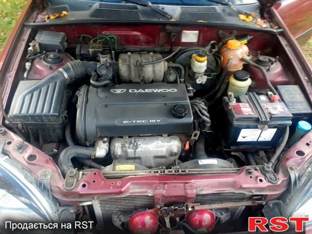 Червоний ЗАЗ Ланос, об'ємом двигуна 1.6 л та пробігом 227 тис. км за 2000 $, фото 6 на Automoto.ua