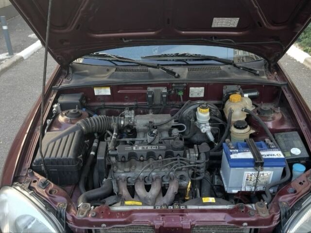 Красный ЗАЗ Ланос, объемом двигателя 1.5 л и пробегом 150 тыс. км за 2100 $, фото 6 на Automoto.ua