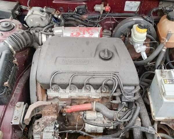 Красный ЗАЗ Ланос, объемом двигателя 1.39 л и пробегом 190 тыс. км за 1850 $, фото 9 на Automoto.ua