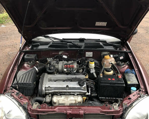 Красный ЗАЗ Ланос, объемом двигателя 1.6 л и пробегом 185 тыс. км за 2300 $, фото 6 на Automoto.ua