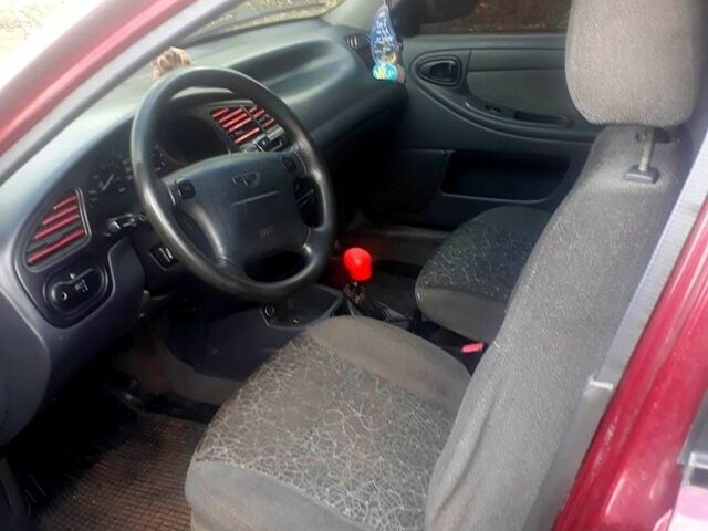 Червоний ЗАЗ Ланос, об'ємом двигуна 1.6 л та пробігом 227 тис. км за 2000 $, фото 4 на Automoto.ua