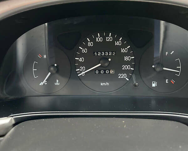 Красный ЗАЗ Ланос, объемом двигателя 1.39 л и пробегом 123 тыс. км за 3000 $, фото 9 на Automoto.ua