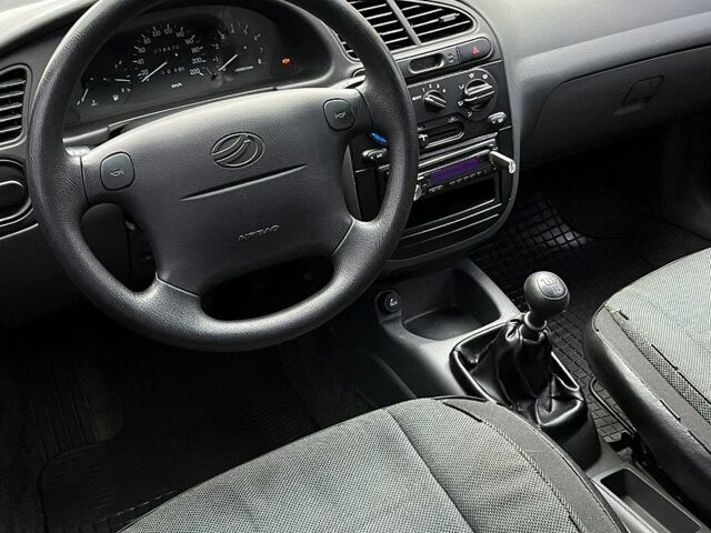 Красный ЗАЗ Ланос, объемом двигателя 1.5 л и пробегом 74 тыс. км за 3200 $, фото 4 на Automoto.ua