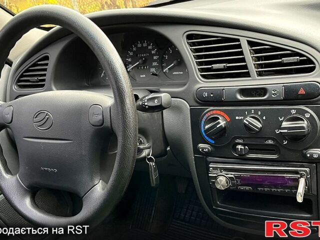 Красный ЗАЗ Ланос, объемом двигателя 1.5 л и пробегом 74 тыс. км за 3200 $, фото 6 на Automoto.ua