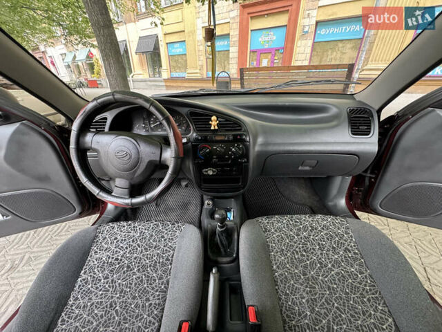 Красный ЗАЗ Ланос, объемом двигателя 1.5 л и пробегом 128 тыс. км за 3600 $, фото 6 на Automoto.ua