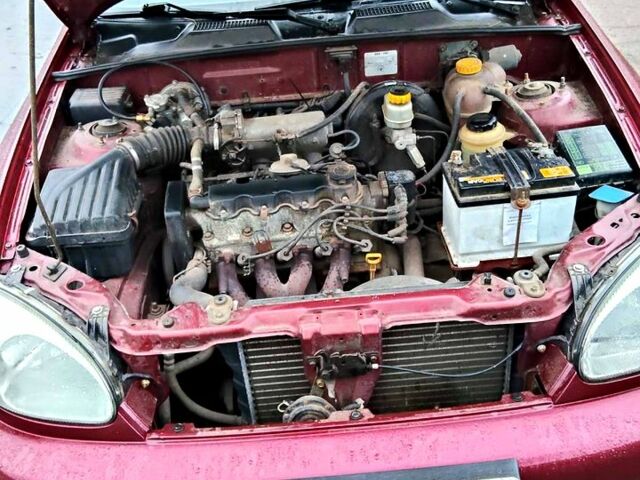 Красный ЗАЗ Ланос, объемом двигателя 1.5 л и пробегом 200 тыс. км за 2400 $, фото 6 на Automoto.ua