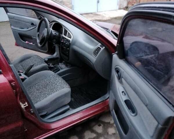 Красный ЗАЗ Ланос, объемом двигателя 1.3 л и пробегом 105 тыс. км за 2450 $, фото 10 на Automoto.ua