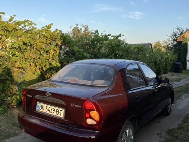 Красный ЗАЗ Ланос, объемом двигателя 1.5 л и пробегом 250 тыс. км за 1799 $, фото 4 на Automoto.ua