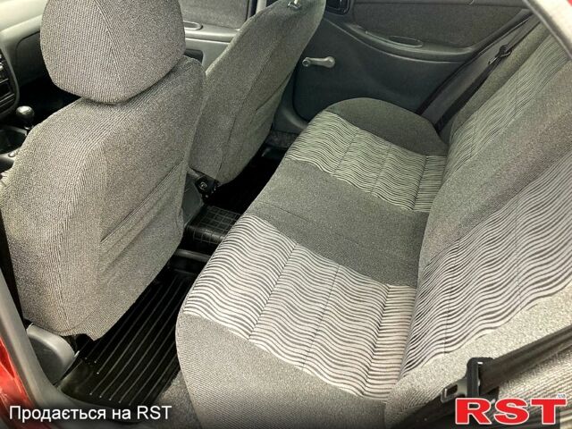 Красный ЗАЗ Ланос, объемом двигателя 1.5 л и пробегом 159 тыс. км за 3750 $, фото 6 на Automoto.ua