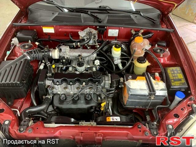 Красный ЗАЗ Ланос, объемом двигателя 1.5 л и пробегом 159 тыс. км за 3750 $, фото 3 на Automoto.ua