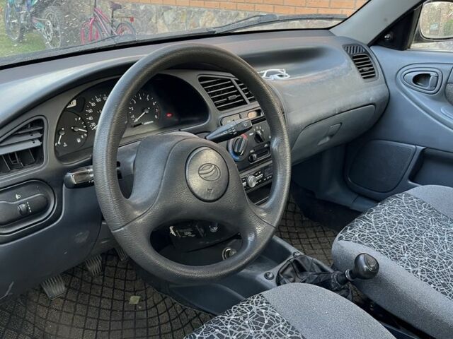 Красный ЗАЗ Ланос, объемом двигателя 1.5 л и пробегом 250 тыс. км за 1799 $, фото 1 на Automoto.ua