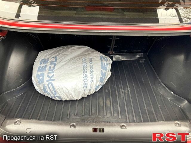 Красный ЗАЗ Ланос, объемом двигателя 1.5 л и пробегом 159 тыс. км за 3750 $, фото 8 на Automoto.ua