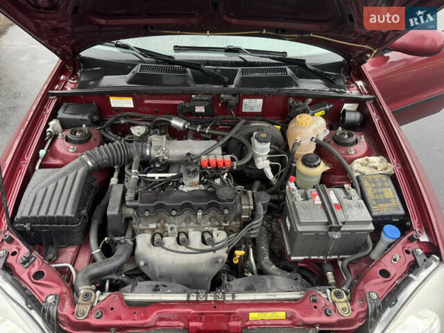Красный ЗАЗ Ланос, объемом двигателя 1.5 л и пробегом 98 тыс. км за 3300 $, фото 16 на Automoto.ua