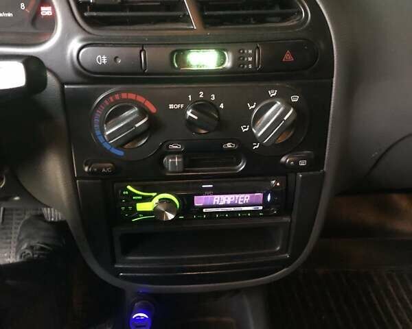 Красный ЗАЗ Ланос, объемом двигателя 1.5 л и пробегом 76 тыс. км за 3800 $, фото 4 на Automoto.ua