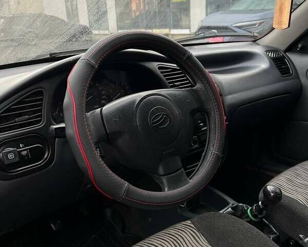 Красный ЗАЗ Ланос, объемом двигателя 1.5 л и пробегом 99 тыс. км за 2450 $, фото 18 на Automoto.ua