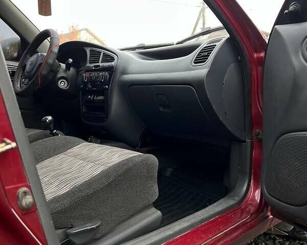 Красный ЗАЗ Ланос, объемом двигателя 1.5 л и пробегом 99 тыс. км за 2450 $, фото 1 на Automoto.ua