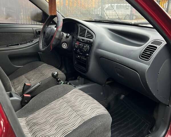 Красный ЗАЗ Ланос, объемом двигателя 1.5 л и пробегом 99 тыс. км за 2450 $, фото 14 на Automoto.ua