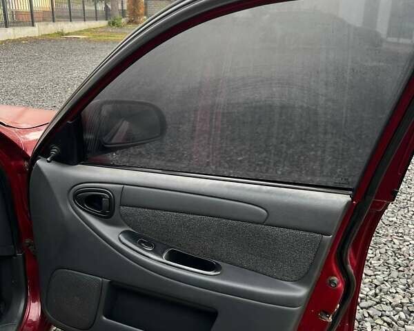 Красный ЗАЗ Ланос, объемом двигателя 1.5 л и пробегом 99 тыс. км за 2450 $, фото 16 на Automoto.ua