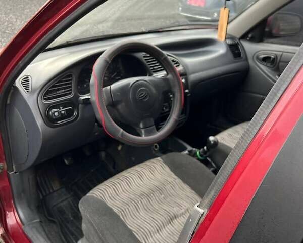 Красный ЗАЗ Ланос, объемом двигателя 1.5 л и пробегом 99 тыс. км за 2450 $, фото 15 на Automoto.ua