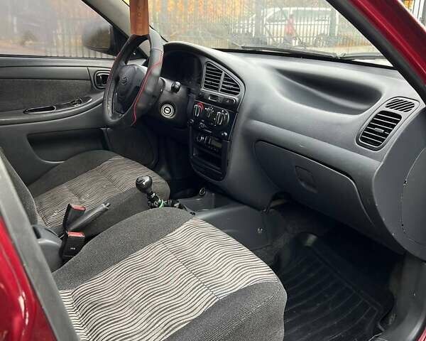 Красный ЗАЗ Ланос, объемом двигателя 1.5 л и пробегом 99 тыс. км за 2450 $, фото 22 на Automoto.ua