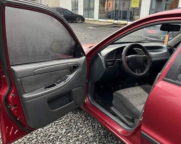 Красный ЗАЗ Ланос, объемом двигателя 1.5 л и пробегом 99 тыс. км за 2450 $, фото 20 на Automoto.ua