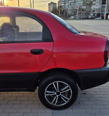 Красный ЗАЗ Ланос, объемом двигателя 1.5 л и пробегом 144 тыс. км за 2500 $, фото 2 на Automoto.ua