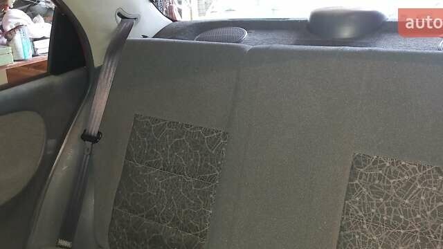 Красный ЗАЗ Ланос, объемом двигателя 1.39 л и пробегом 91 тыс. км за 3200 $, фото 2 на Automoto.ua