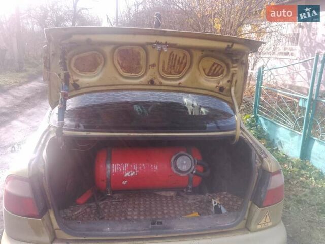 Жовтий ЗАЗ Ланос, об'ємом двигуна 1.39 л та пробігом 300 тис. км за 1350 $, фото 7 на Automoto.ua