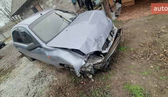 Серый ЗАЗ Ланос, объемом двигателя 1.6 л и пробегом 235 тыс. км за 944 $, фото 2 на Automoto.ua