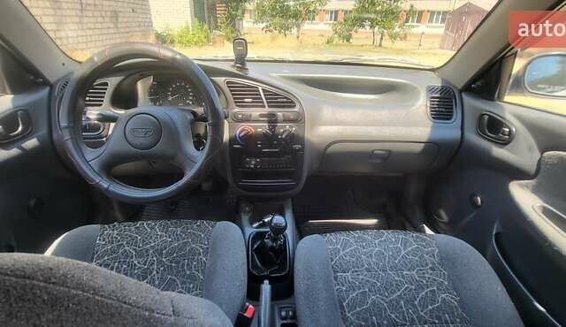 Сірий ЗАЗ Ланос, об'ємом двигуна 1.39 л та пробігом 156 тис. км за 2600 $, фото 4 на Automoto.ua