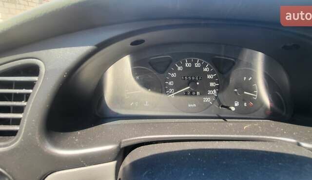 Сірий ЗАЗ Ланос, об'ємом двигуна 1.39 л та пробігом 156 тис. км за 2600 $, фото 5 на Automoto.ua