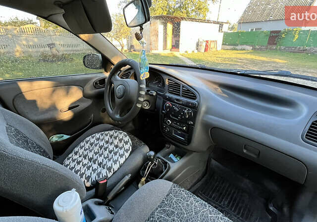Сірий ЗАЗ Ланос, об'ємом двигуна 1.39 л та пробігом 155 тис. км за 2400 $, фото 4 на Automoto.ua