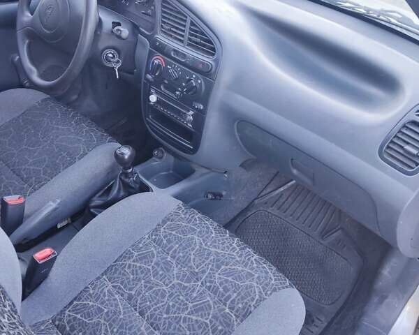 Сірий ЗАЗ Ланос, об'ємом двигуна 1.39 л та пробігом 96 тис. км за 1000 $, фото 7 на Automoto.ua
