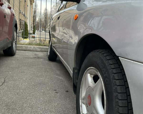 Сірий ЗАЗ Ланос, об'ємом двигуна 1.4 л та пробігом 124 тис. км за 2300 $, фото 3 на Automoto.ua