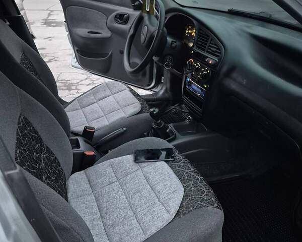 Сірий ЗАЗ Ланос, об'ємом двигуна 1.4 л та пробігом 112 тис. км за 2300 $, фото 3 на Automoto.ua